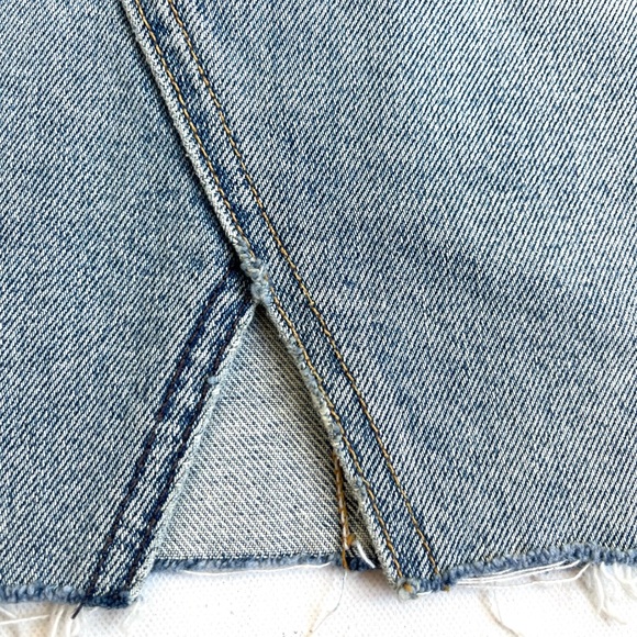 GRLFRND x REVOLVE Milla Zappa Light Wash Denim Mini Skirt with Raw Hem - Picture 4 of 8